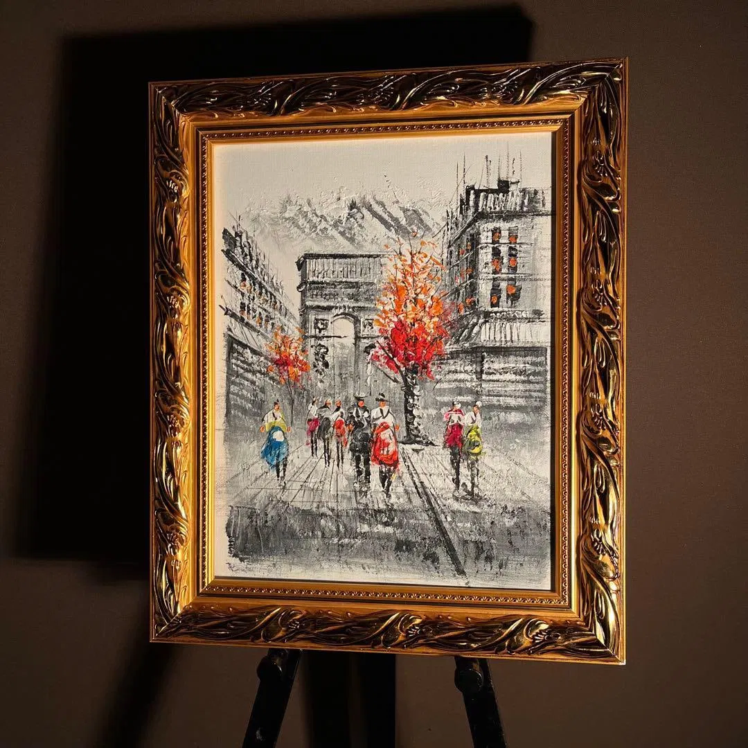 The oil painting featuring a motif of a skull and triangle, with a gold frame.