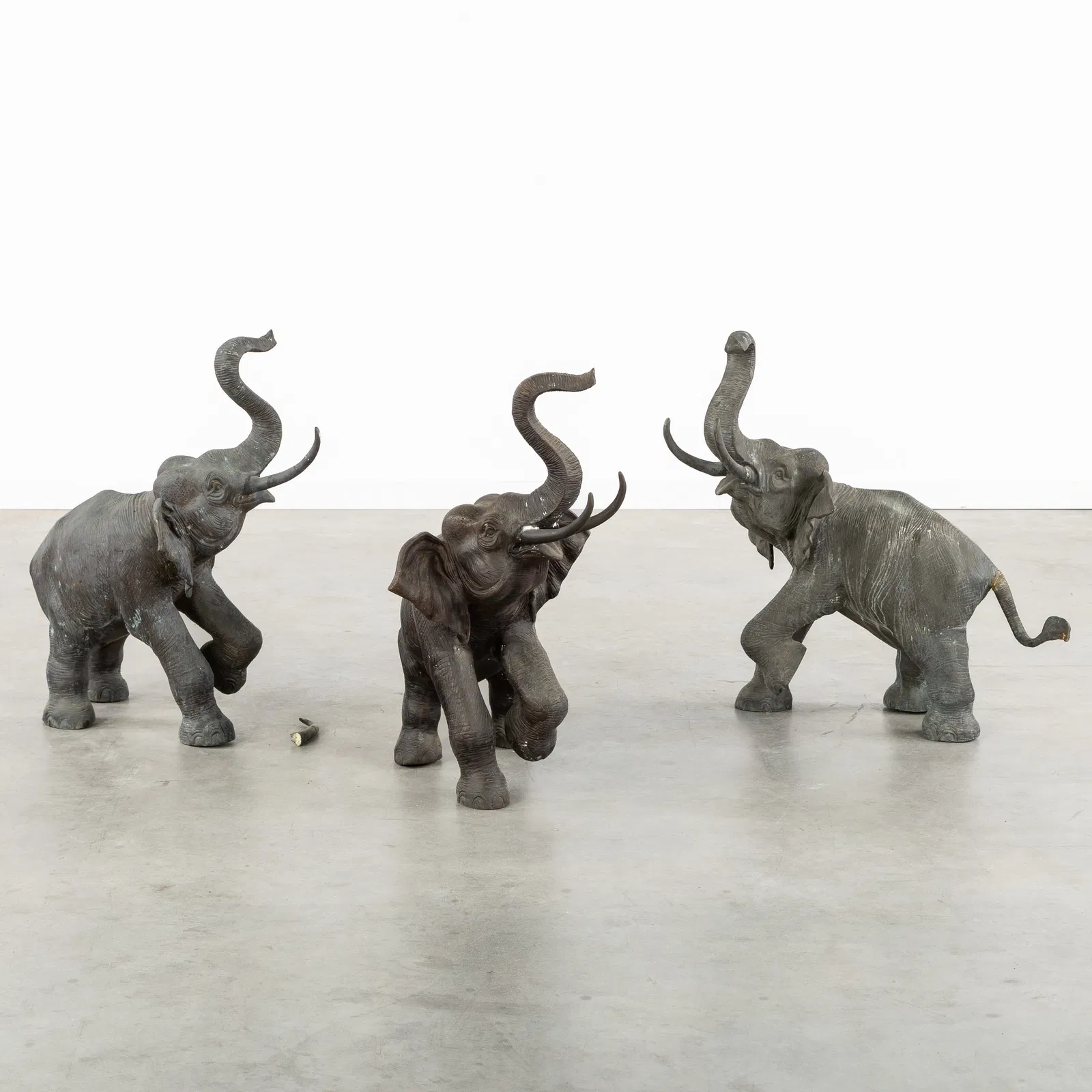 Three decorative 'Elephant' garden statues, patinated bronze.