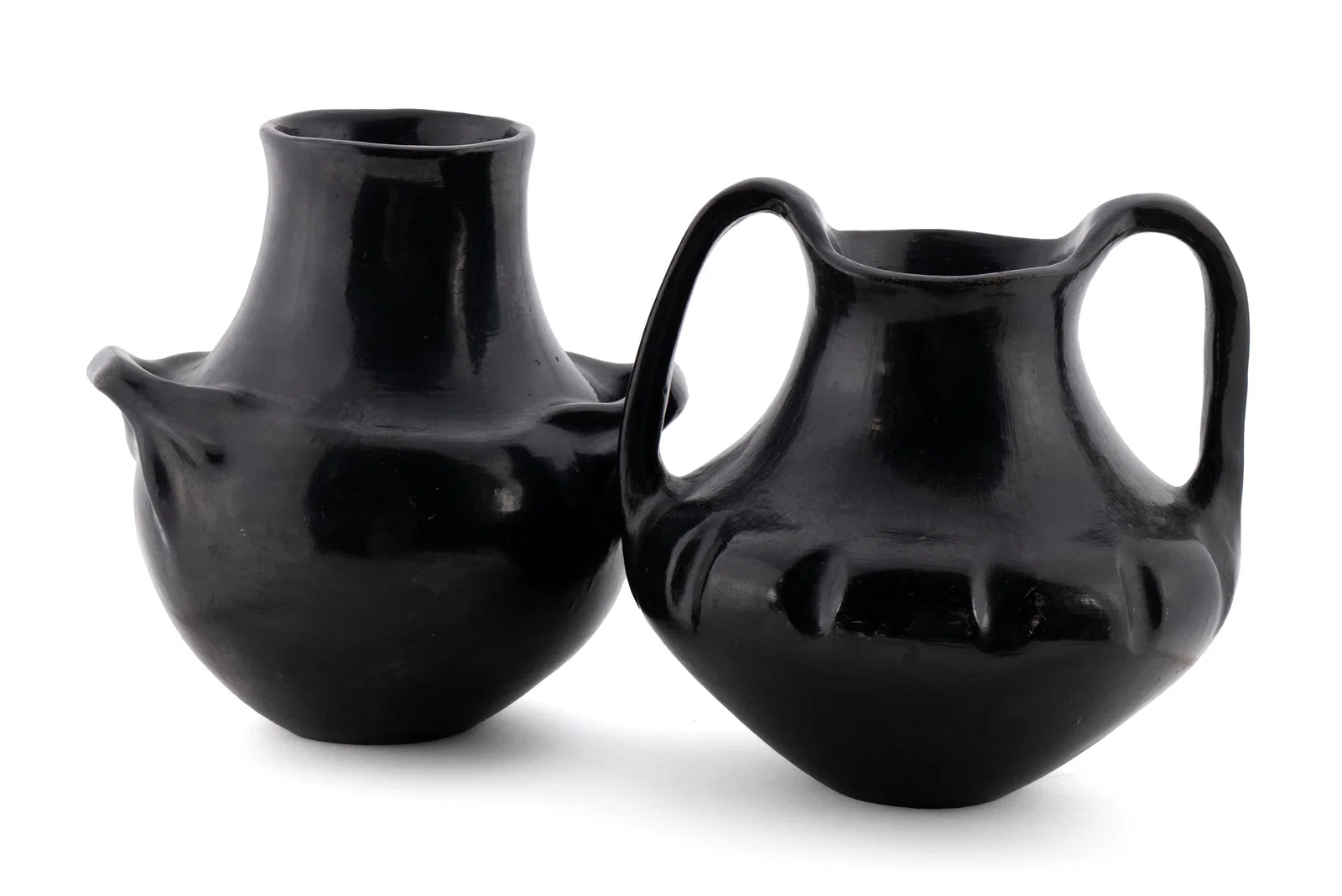 TWO BLACKWARE DOUBLE-HANDLED JARS ATTRIBUTED TO SANTA CLARA PUEBLO
