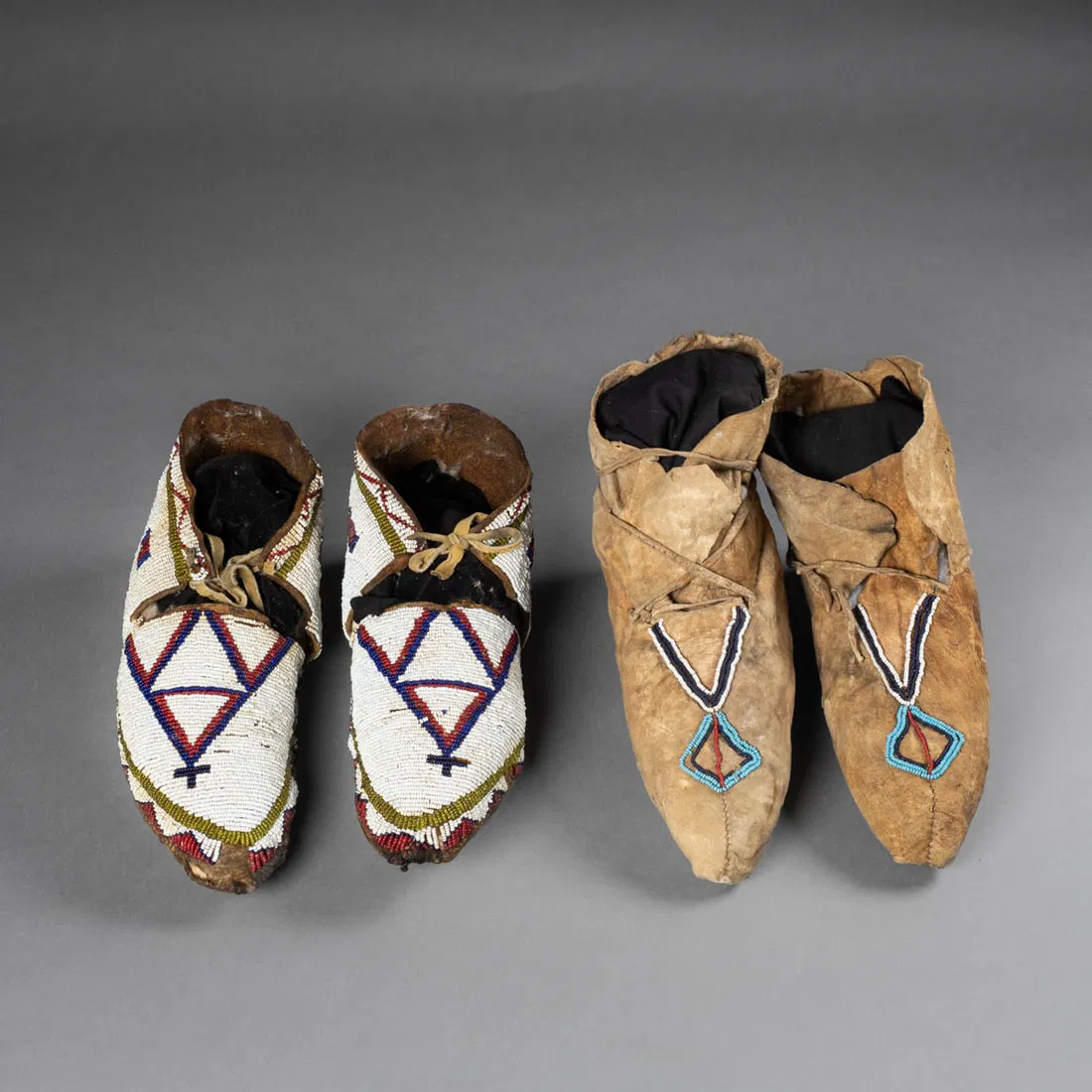 Two pair of Plains beaded hide moccasins