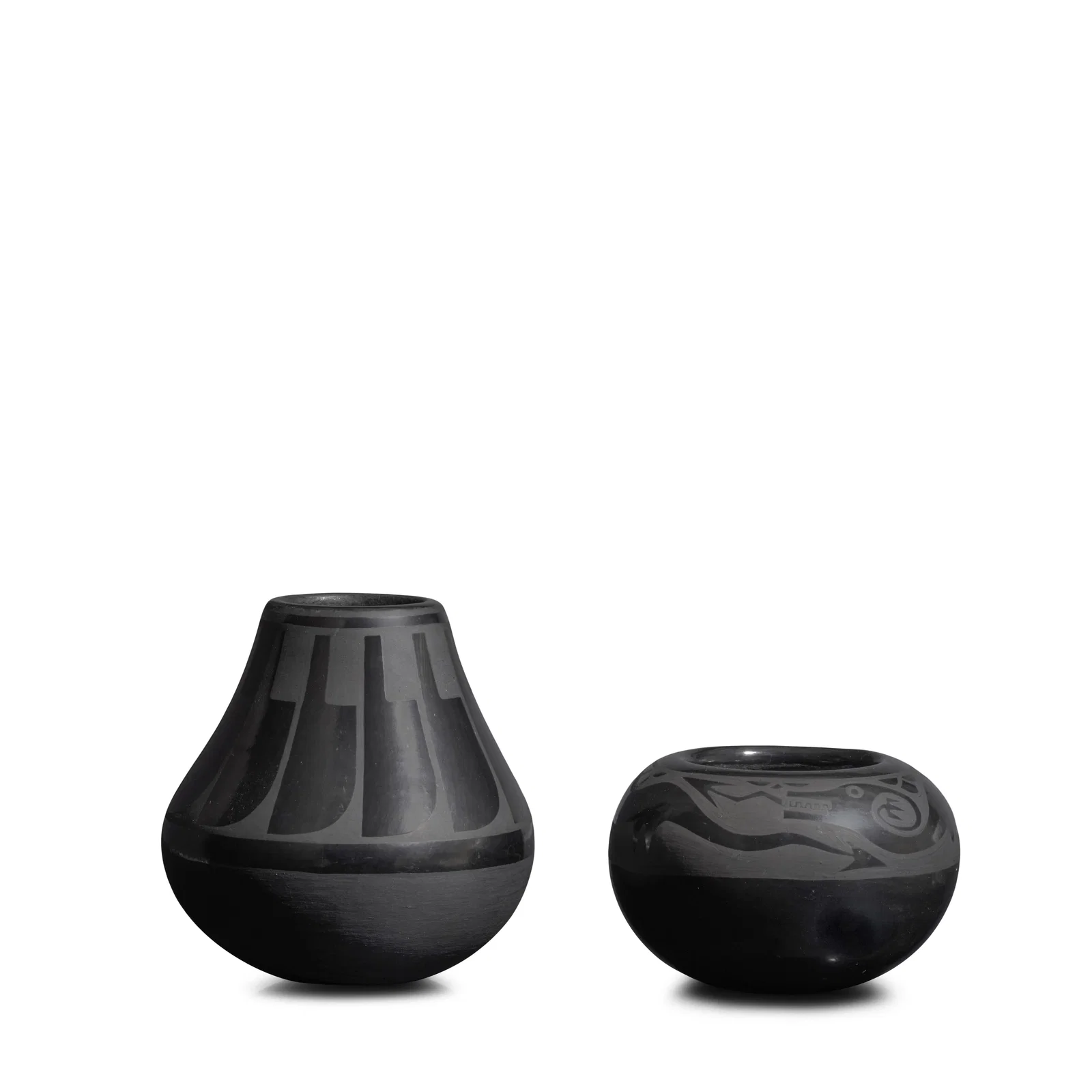 Two petite Crucita Calabaza (Blue Corn) blackware jars