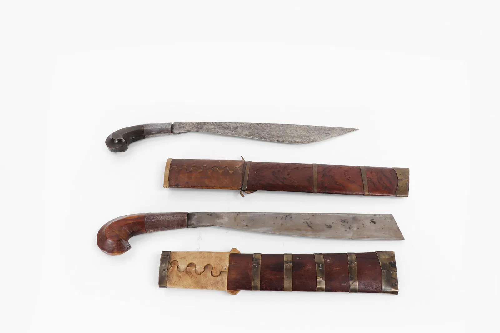 Two Visayan Ginunting swords & Scabbards