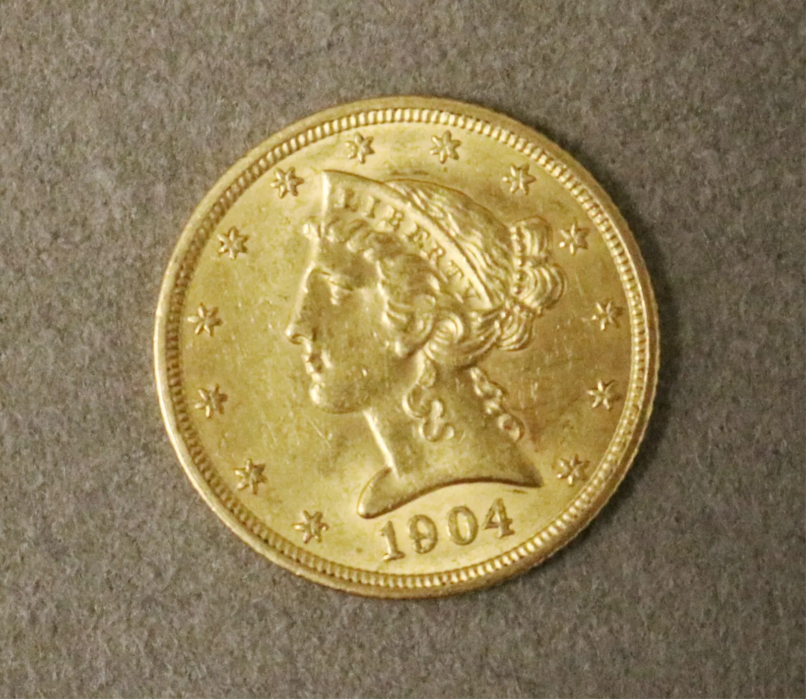 U.S FIVE-DOLLAR GOLD COIN DATED 1904 - .