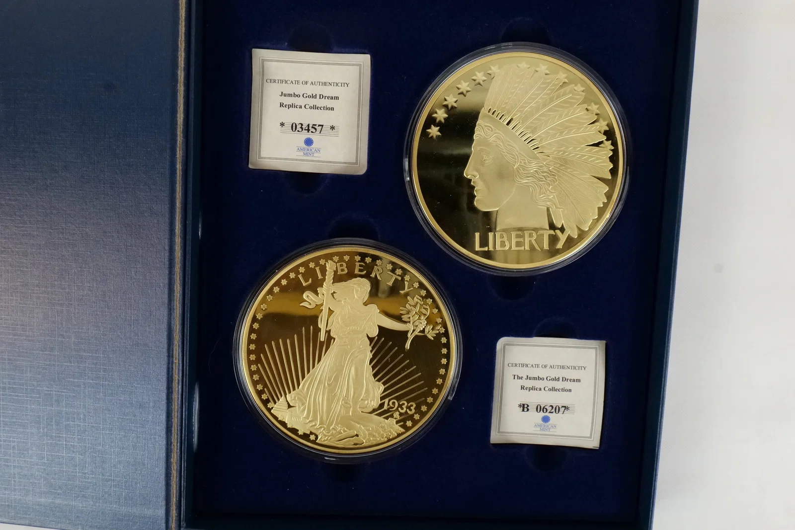 US A Pair of American Mint Jumbo Gold Dream Replica Medals