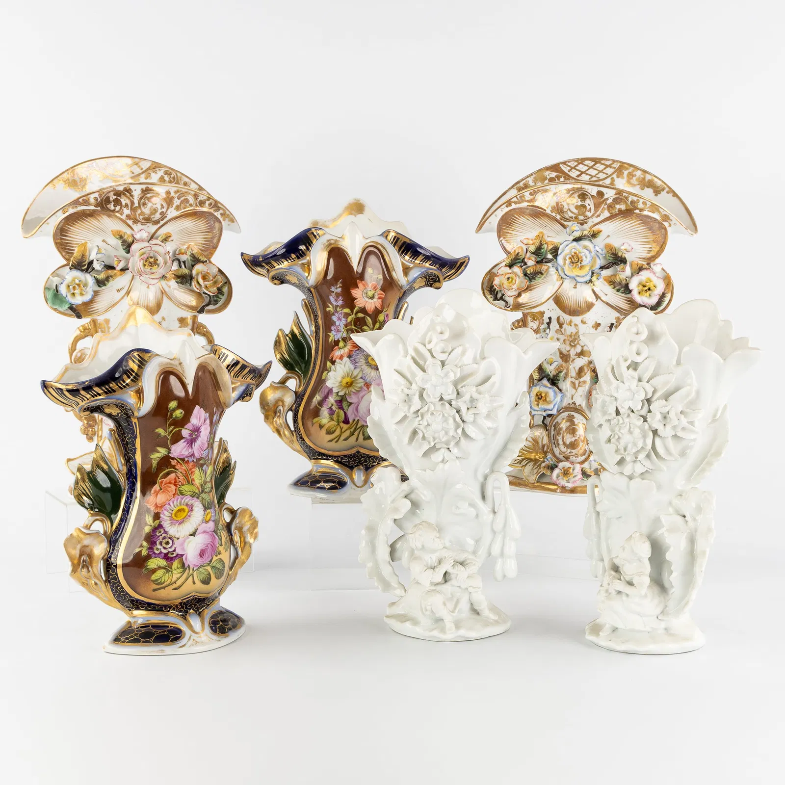 Vieux Paris, Three Pairs of vases, polychrome and gilded porcelain, 19th C.