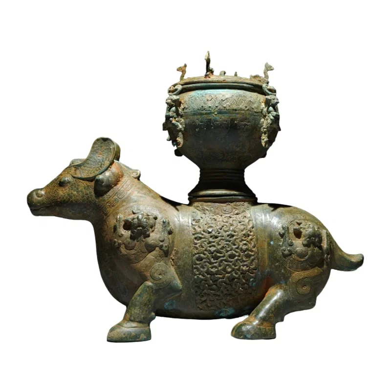 Warring States Period bronze zun with coiled dragon and beast-shaped lid.