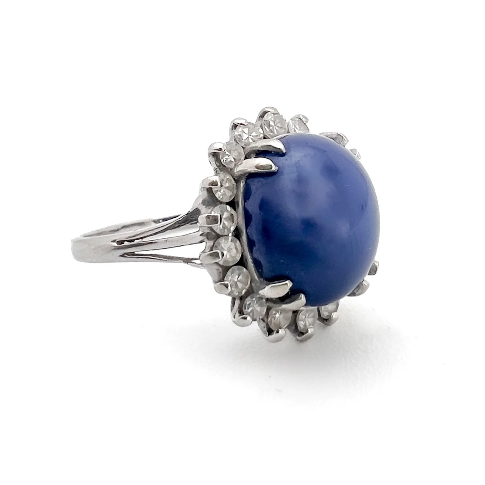 White Gold Ring with Star Sapphire and Diamond Halo