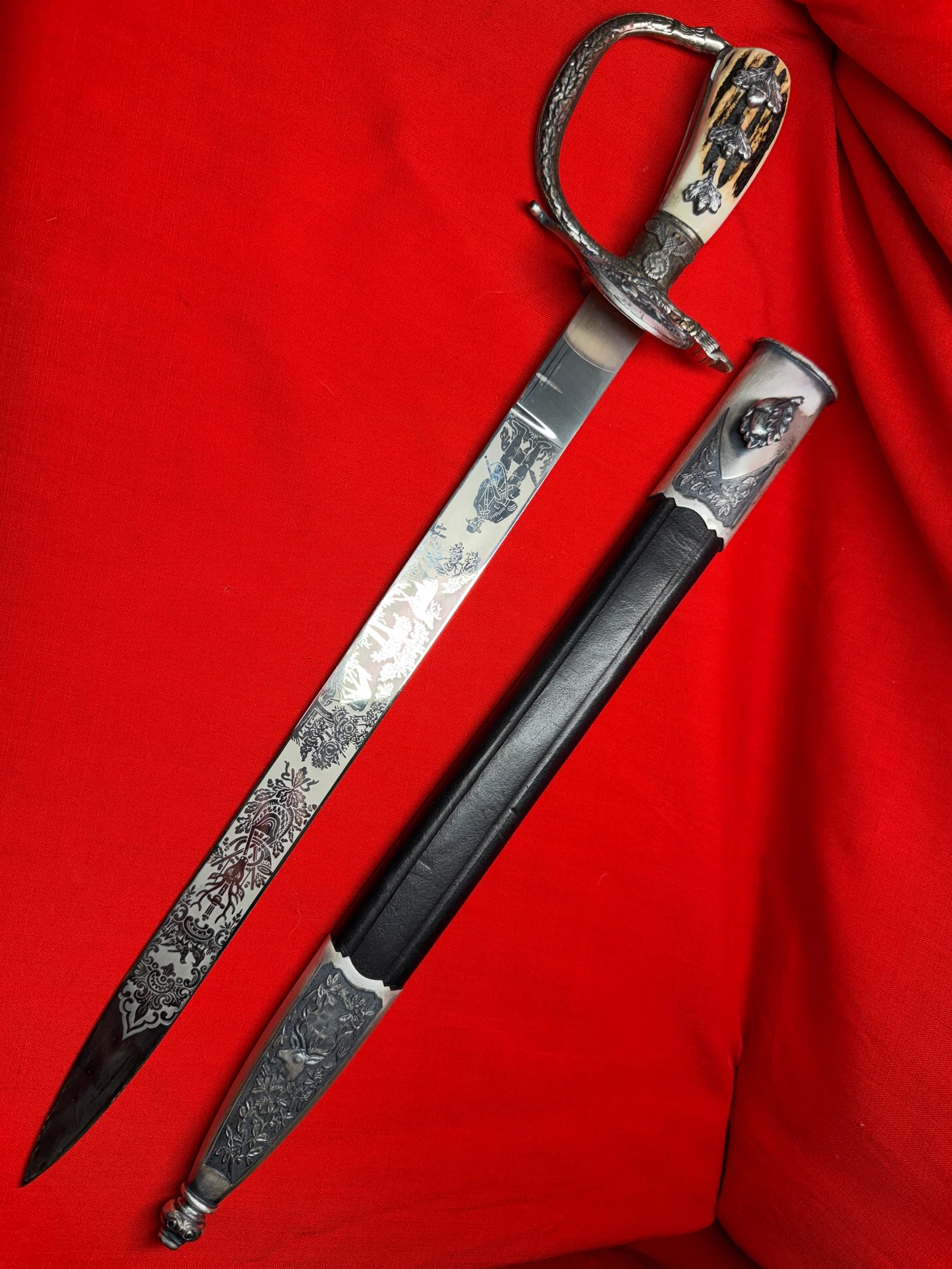 WW2 German-Style Ornate Hunting Dagger with Etched Blade, Eagle Motif, and Scabbard