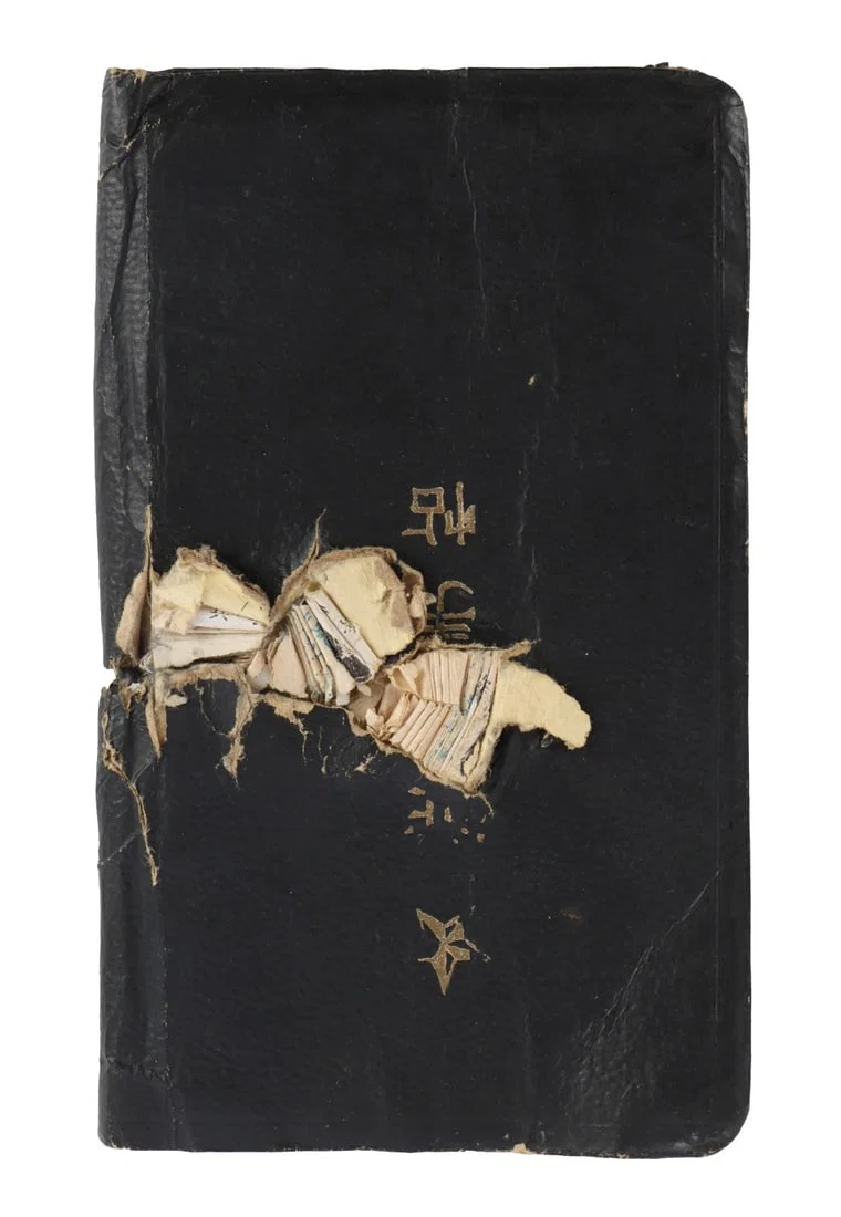 WWII IMPERIAL JAPANESE NOTEBOOK SHOT THROUGH