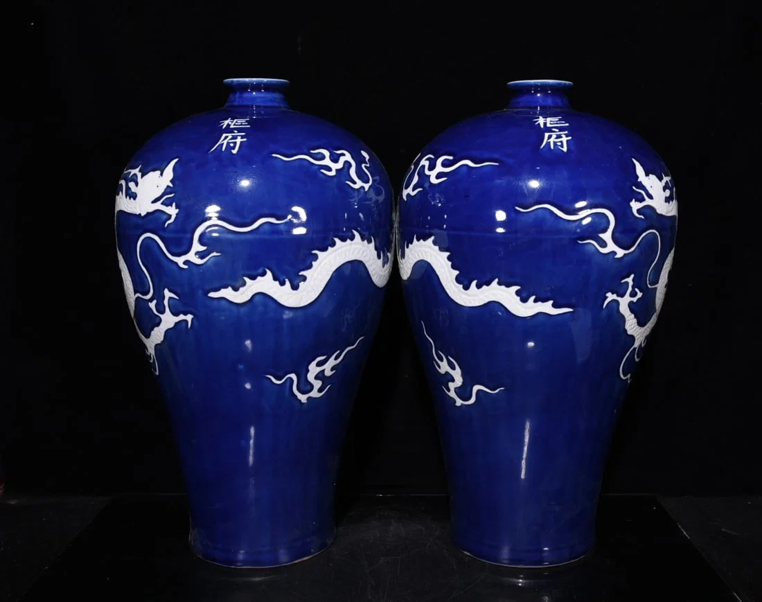 Yuan Dynasty sacrificial blue glaze relief gilt white dragon pattern plum vase pair